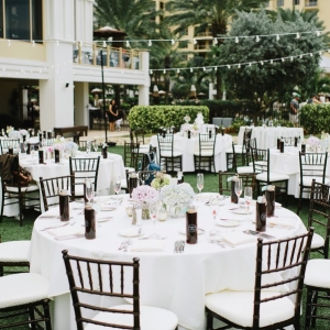 Black Chivari Chairs with Pastel Wedding Centerpieces | Outdoor Cafe Lighting Detail at Clearwater Beach Wedding Venue Sandpearl Resort