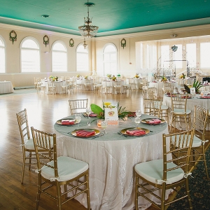Indoor, Historic Tampa, Florida Wedding Reception Venue with Wood Floors and Green Ceiling with Chandeliers and Chiavari Chairs