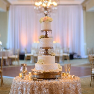Elegant 4-Tier Round White Wedding Cake with Flowers