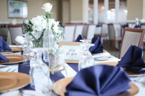 Blue, white, and gold centerpieces