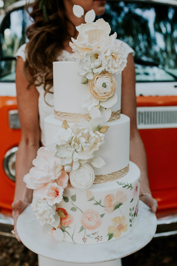 Sugar flower covered wedding cake