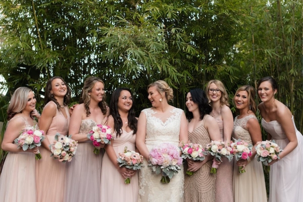 Bride and Bridesmaids Bridal Party Portrait with Ivory, Lace Wedding Dress, Neutral Bella Bridesmaids Dresses and Pink and White Floral Bouquets | St. Petersburg Wedding Photographer Caroline & Evan Photography | Hair and Makeup by Michele Renee The Studi
