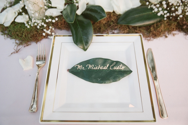 Rustic Wedding Table Setting and Name Card with Ivory Rose Petals, Baby’s Breath and Greenery