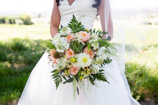 Peach floral and succulent bridal bouquet