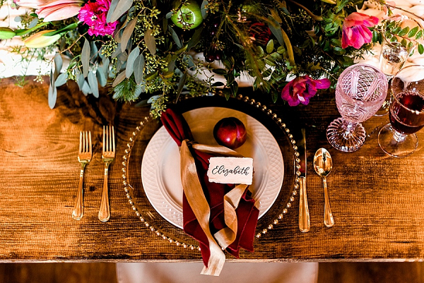 Burgundy and gold place setting