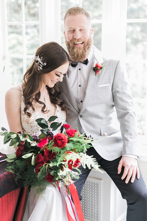 elegant couple in gray and red on Mountainside Bride