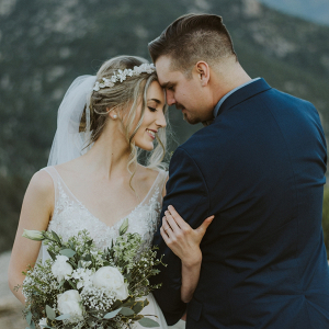Bride and groom in mountains