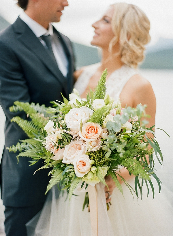 Bride and groom with bouquet