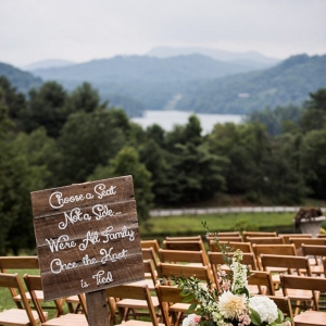 Choose a seat sign with smoky mountain backdrop