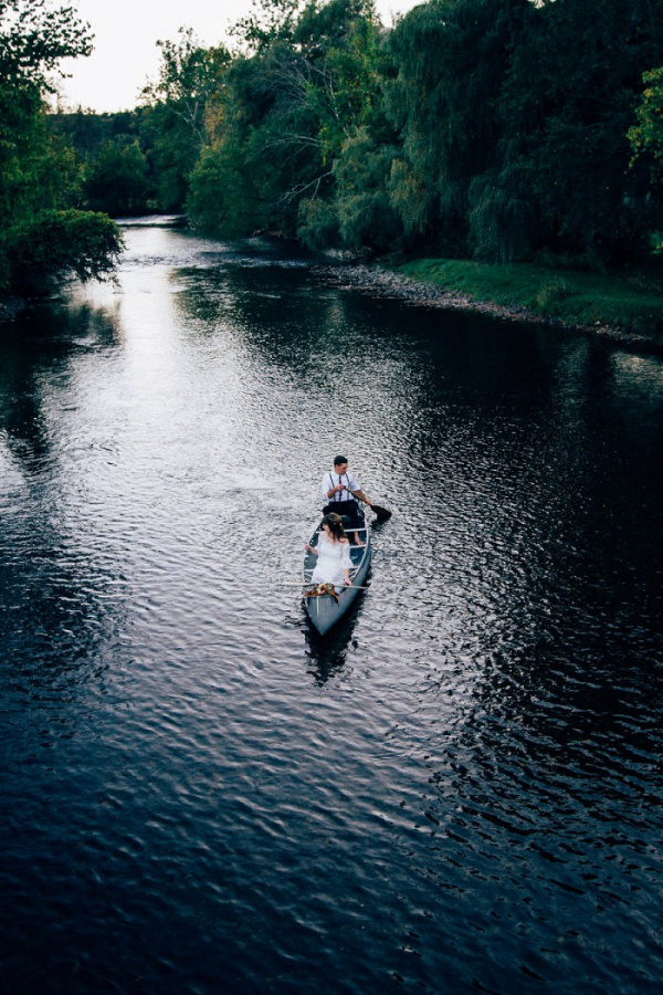 Bride and groom canoe