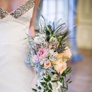 Cascading vintage bouquet with peacock feathers