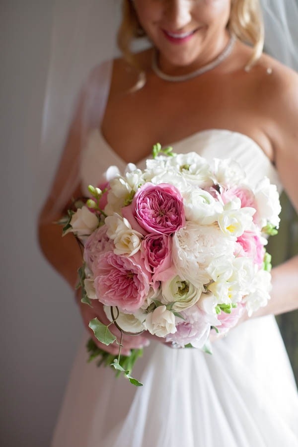 Elegant pink and white bouquet with peonies, roses, and ivy