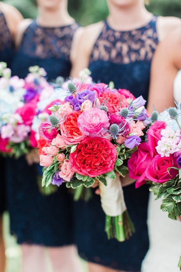 Preppy bridesmaid bouquets with fuchsia and purple flowers