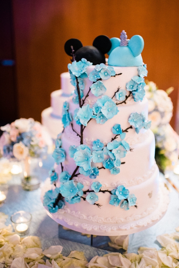 Elegant Disney wedding cake with Mickey Mouse ear cake topper