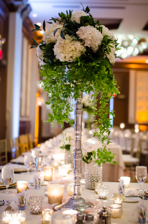 Tall centerpiece with greenery