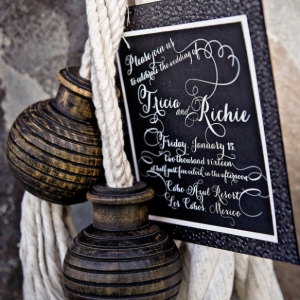 Modern textured black wedding invitation with nautical accents
