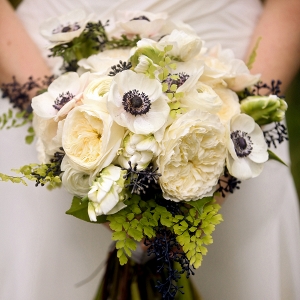 Cream and navy blue wedding bouquet with anemone and peonies