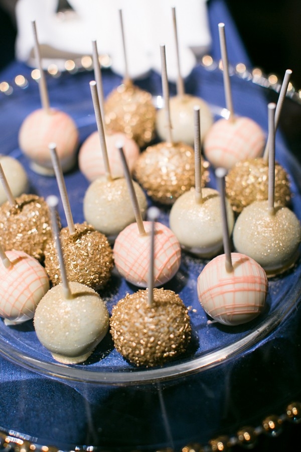 Pink, white and gold cake pops cutely decorated with glitter and stripes