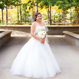 Elegant bride wearing a ball gown wedding dress with sweetheart neckline