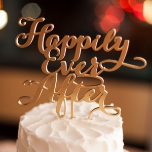 "Happily ever after" gold script wedding cake topper