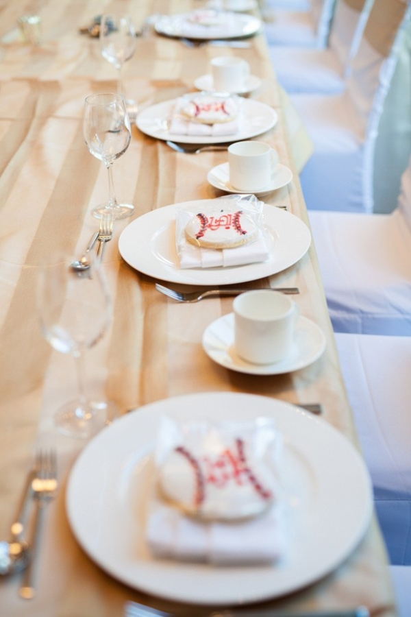 Baseball cookie wedding favors set out at each place setting