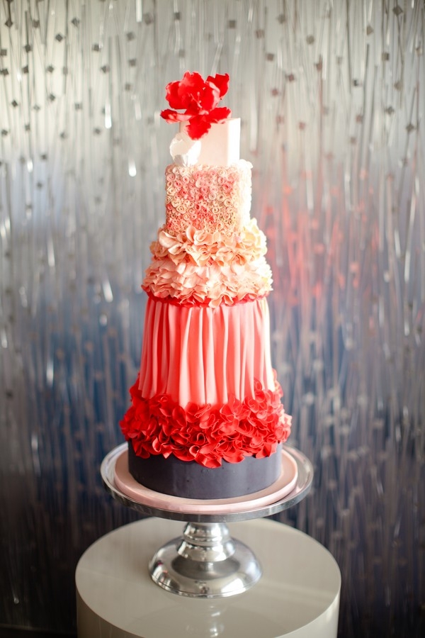 Modern coral wedding cake with different textures