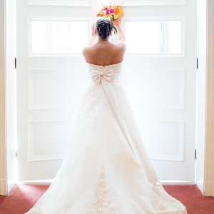 Traditional Alfred Angelo wedding dress with sash tied in a bow