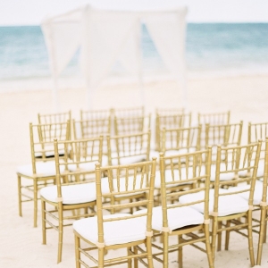 Gold chiavari chairs for beach wedding in Jamaica