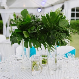 Tropical tablescape with striped tablecloth