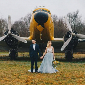 Vintage airplane engagement session with blue tulle dress