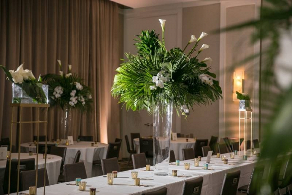 Tall palm leaf wedding centerpieces