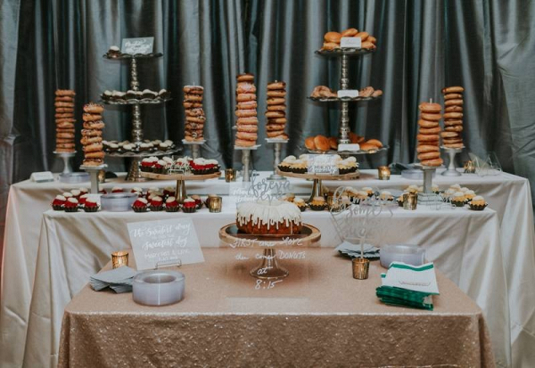 Dessert display with doughnuts and bundt cake
