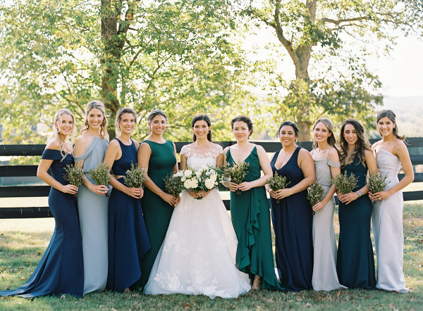 Blue, teal, and gray mismatched bridesmaid dresses