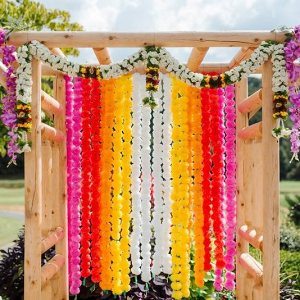 Colorful hanging flower ceremony backdrop