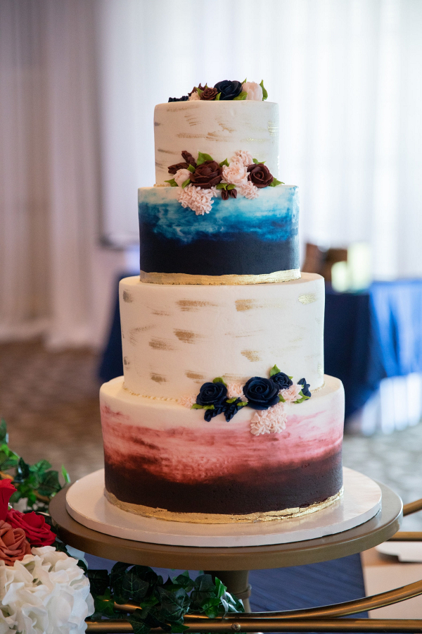 Blue and red painted wedding cake