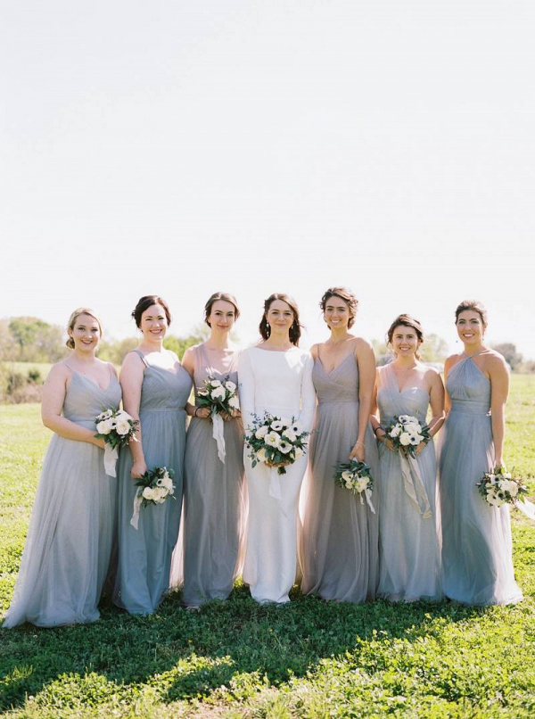 Bridesmaids in mismatched tulle gray dresses