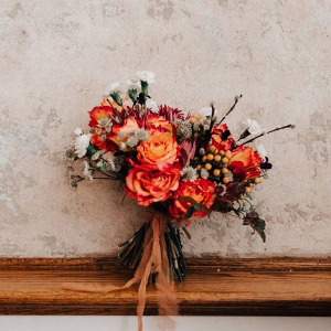 Vibrant orange bridal bouquet