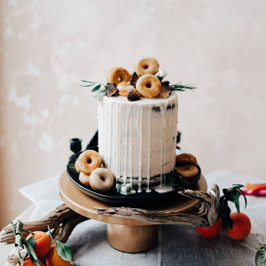 Drip cake with doughnut topper