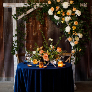 Orange and blue sweetheart table