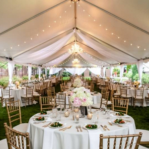 Pink and white tented reception