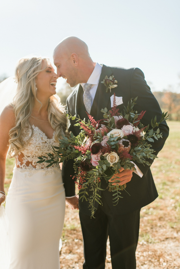 Nashville bride and groom with burgundy bouquet