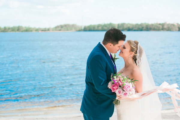 bride and groom on beach at Paradise Cove