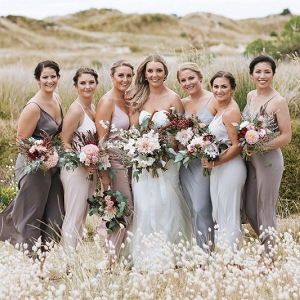 Bridesmaids in neutral dresses