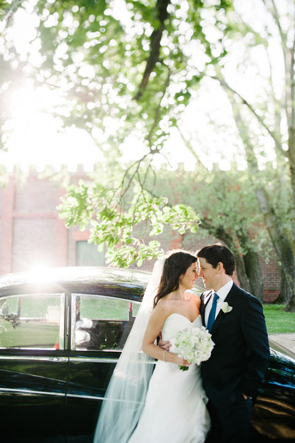 Newlyweds With Vintage Car
