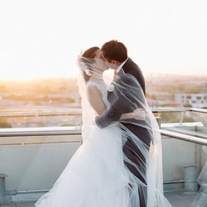 Romantic Sunset Rooftop Wedding Portrait