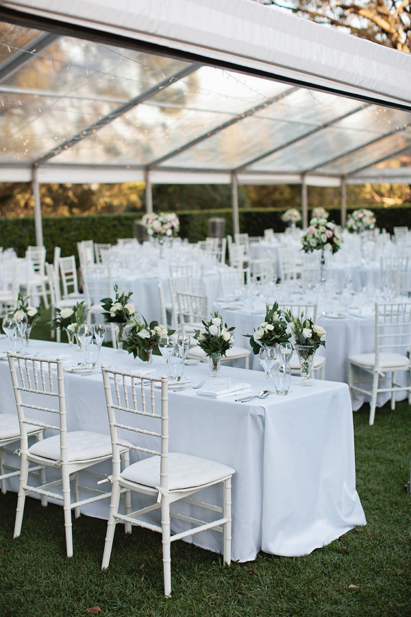Classic white wedding reception with long tables