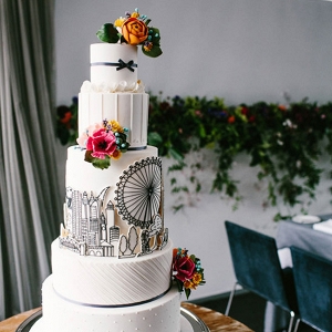 White Wedding Cake With Drawings