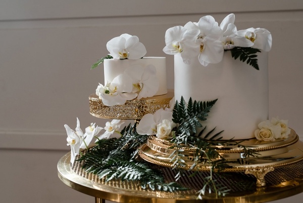 Small white wedding cakes with orchids