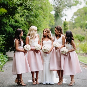 Bridesmaids In Pale Pink Skirts