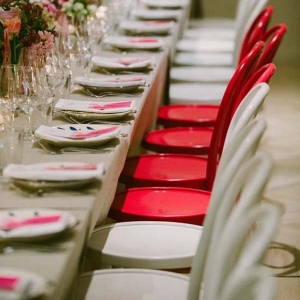 Neon Pink Chairs At Wedding Reception
